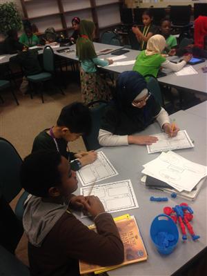 Students developing story maps. 